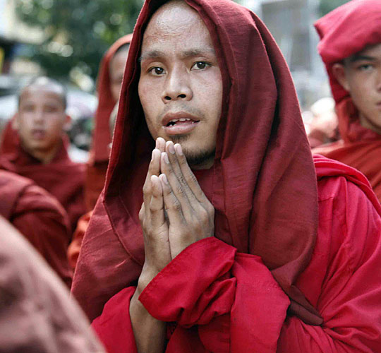 Buddhist monks march down a street in Yangon, Myanmar, on Tuesday.