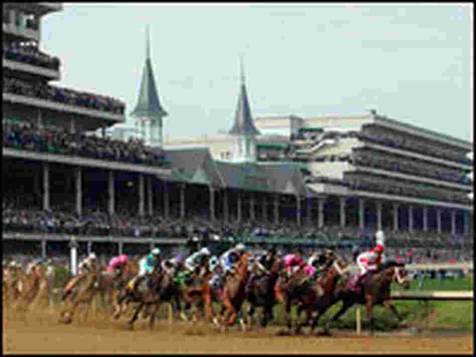 Horses round the first turn during the 133rd Kentucky Derby.