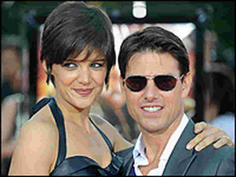 Tom Cruise attends a film premiere with wife Katie Holmes.