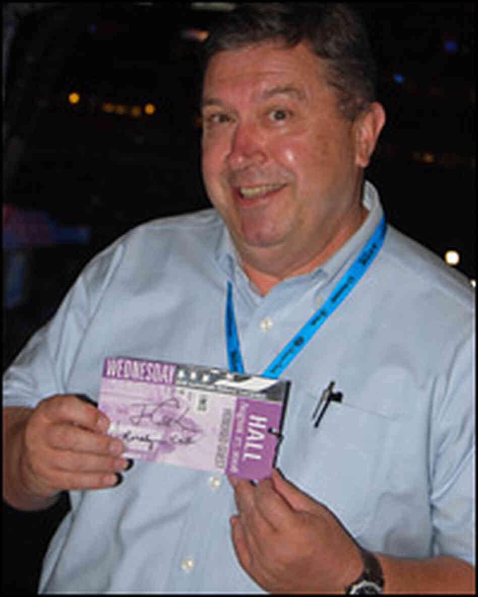 Eric Melder shows off his convention pass, which he asked President Carter to sign. Eric Melder shows off his convention pass, which he asked President Carter to sign.
