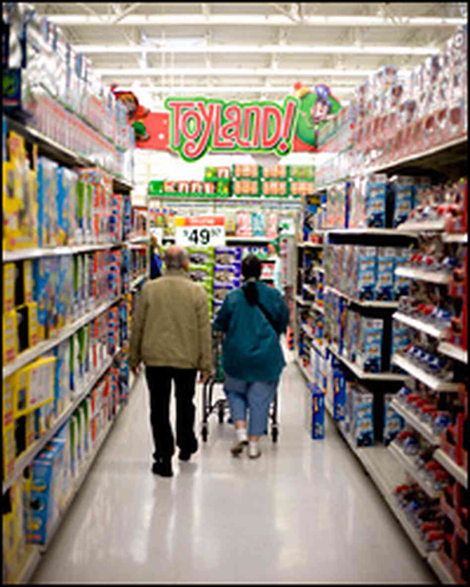 Holiday shoppers walk the aisles of the toy section in a store in New Jersey. Holiday shoppers walk the aisles of the toy section in a store in New Jersey.