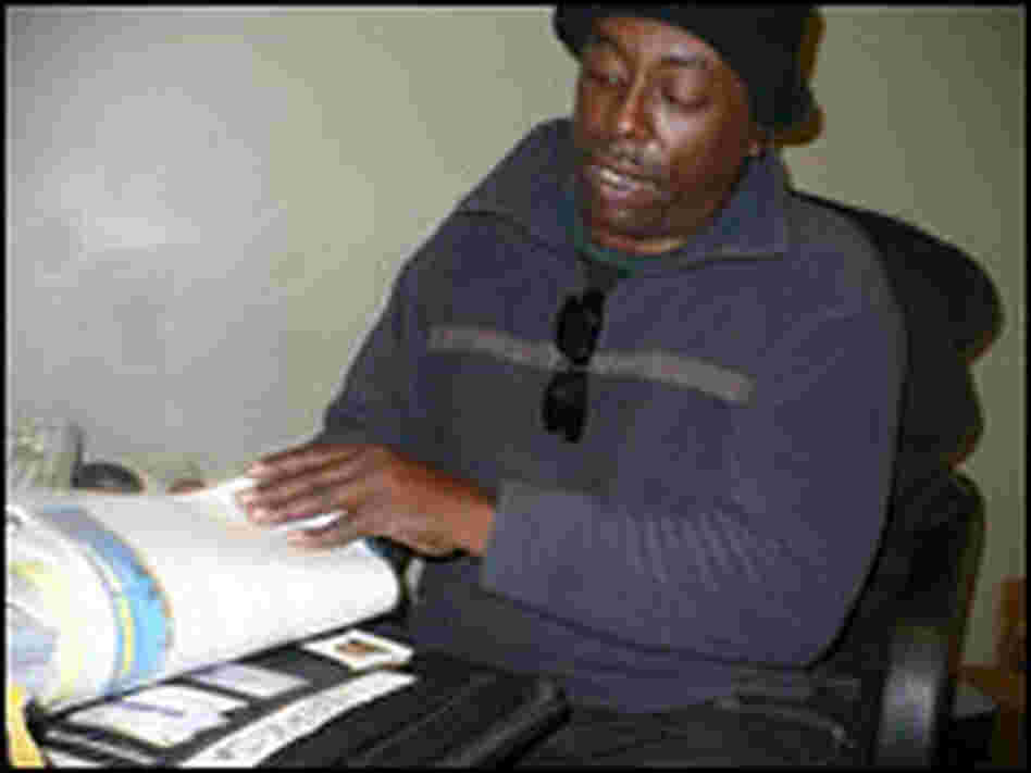 Edward Stewart Jr. looks for a job at an employment center in Kansas City, Mo.