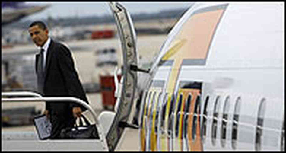 Barack Obama leaves a plane after landing at Dulles Airport in Virginia. Barack Obama leaves a plane after landing at Dulles Airport in Virginia.