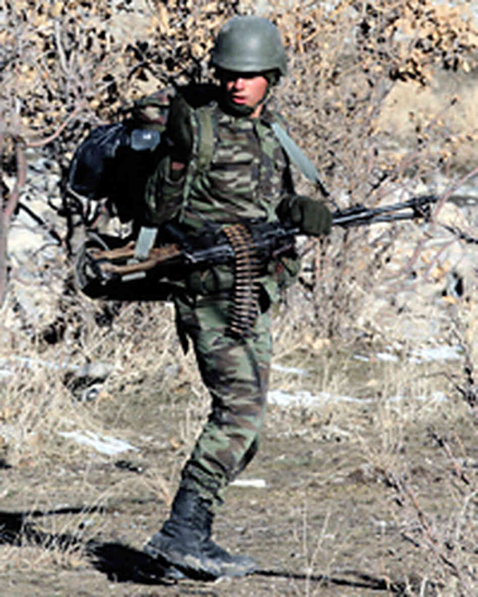 A Turkish soldier patrols an area near Sirnak.
