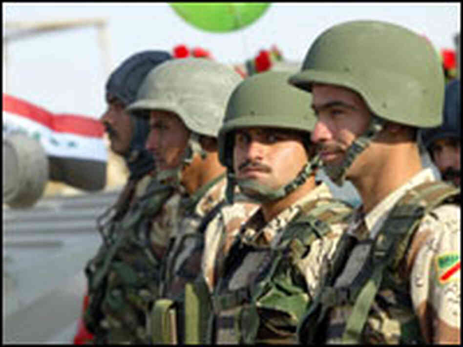 Iraqi soldiers attend celebrations for Army Day in Basra.