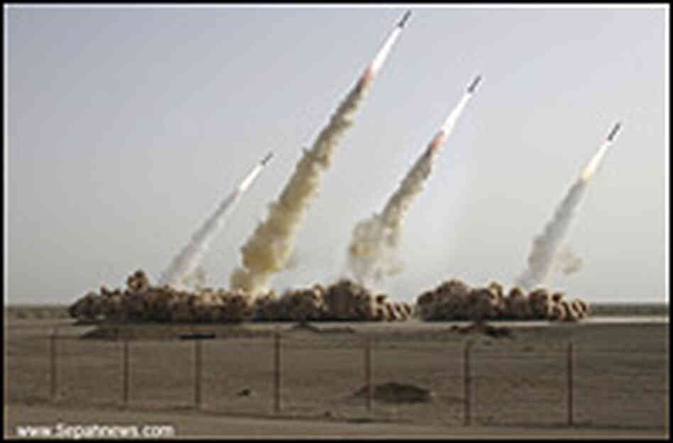An image of four missiles being launched.