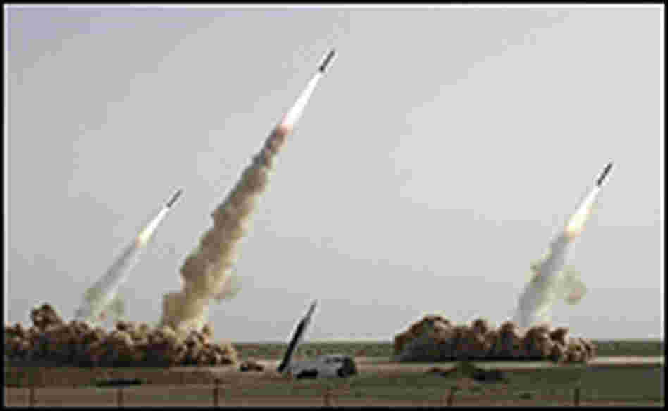 Image showing three missiles being launched.