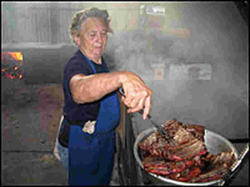 Tootsie Tomanetz working the pit
