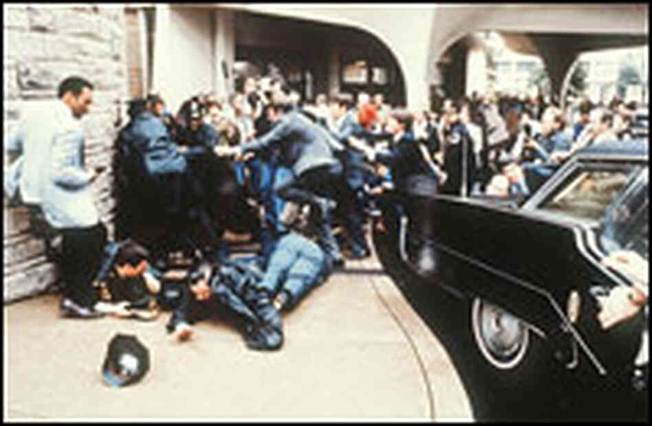 Police and Secret Service agents during Reagan assassination attempt