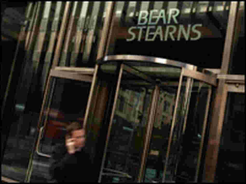 A man walks out of Bear Stearns headquarters in New York.