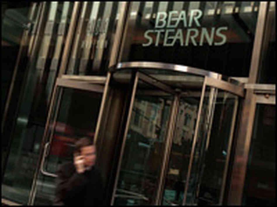 A man walks out of Bear Stearns headquarters in New York.
