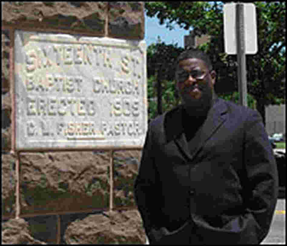 The Rev. Arthur Price Jr. stands near the church.