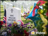 Sarah Baltensperger explains what she has left at her fallen cousin's Arlington grave.