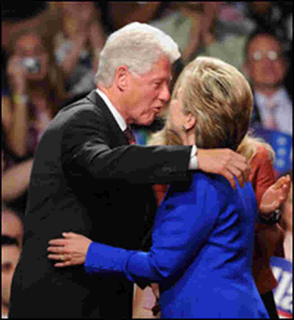 New York Sen. Hillary Clinton gets a hug from her husband.