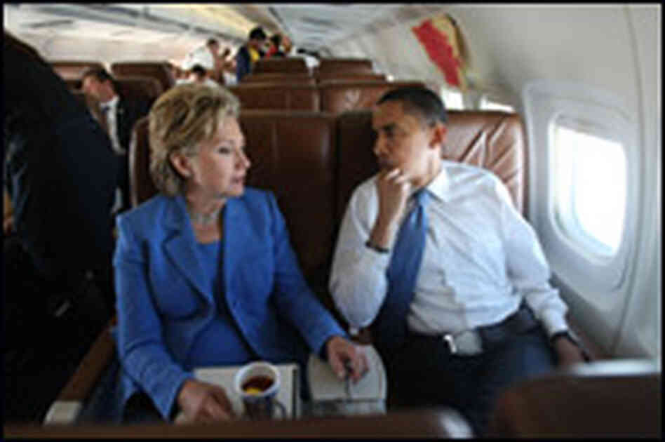 Clinton and Obama on a plane. Clinton and Obama on a plane.