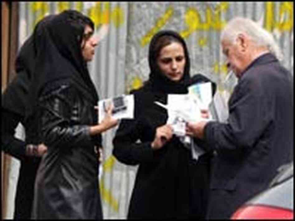 Iranian women distribute leaflets