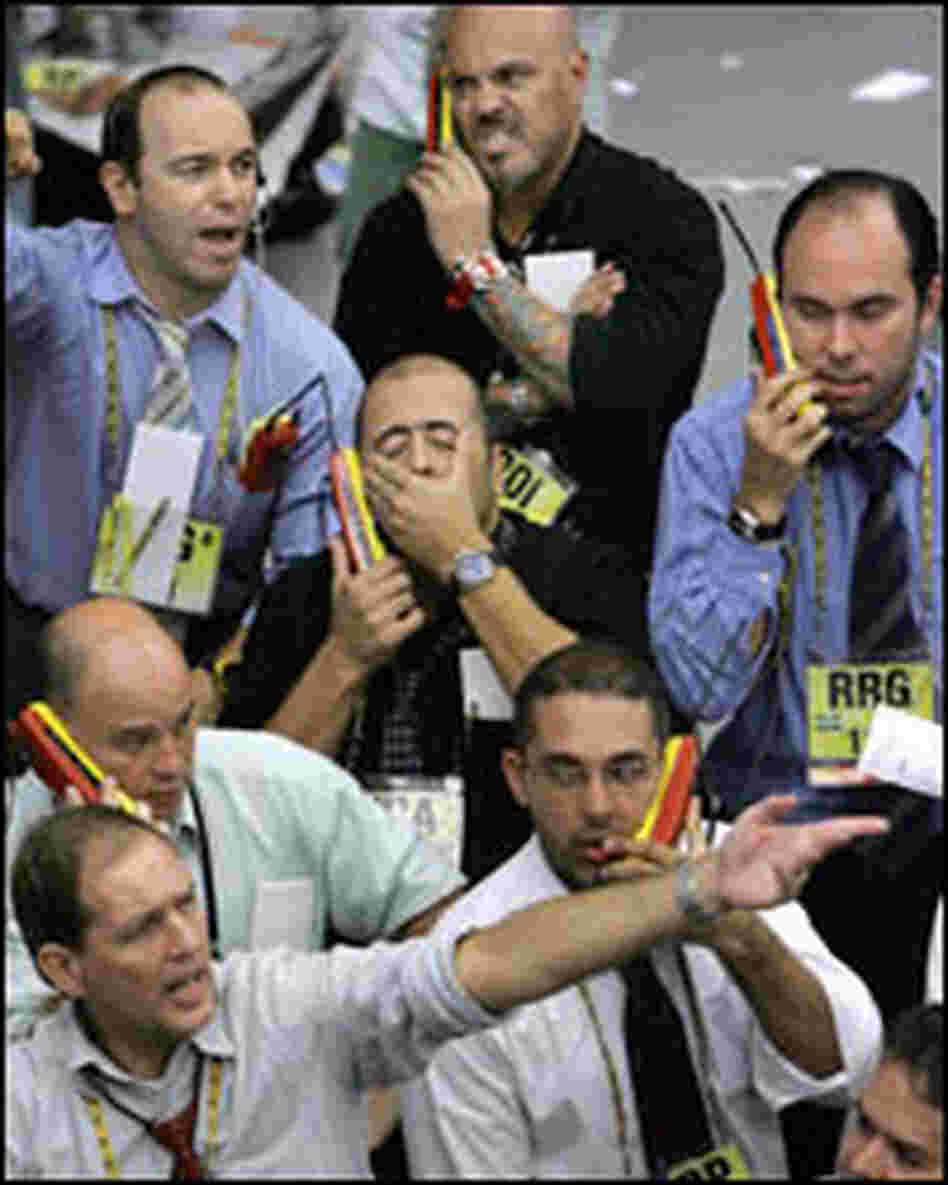 Stock traders negotiate in Sao Paolo Monday morning
