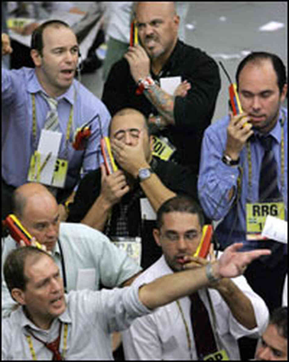 Stock traders negotiate in Sao Paolo Monday morning