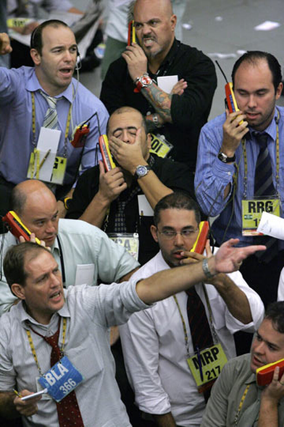 Stock traders negotiate in Sao Paolo Monday morning