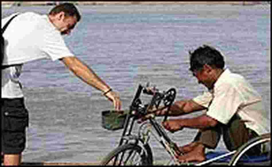 A man donates money A man donates money