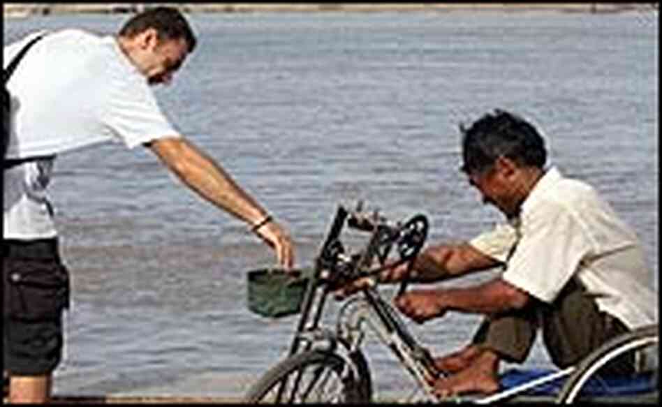 A man donates money A man donates money