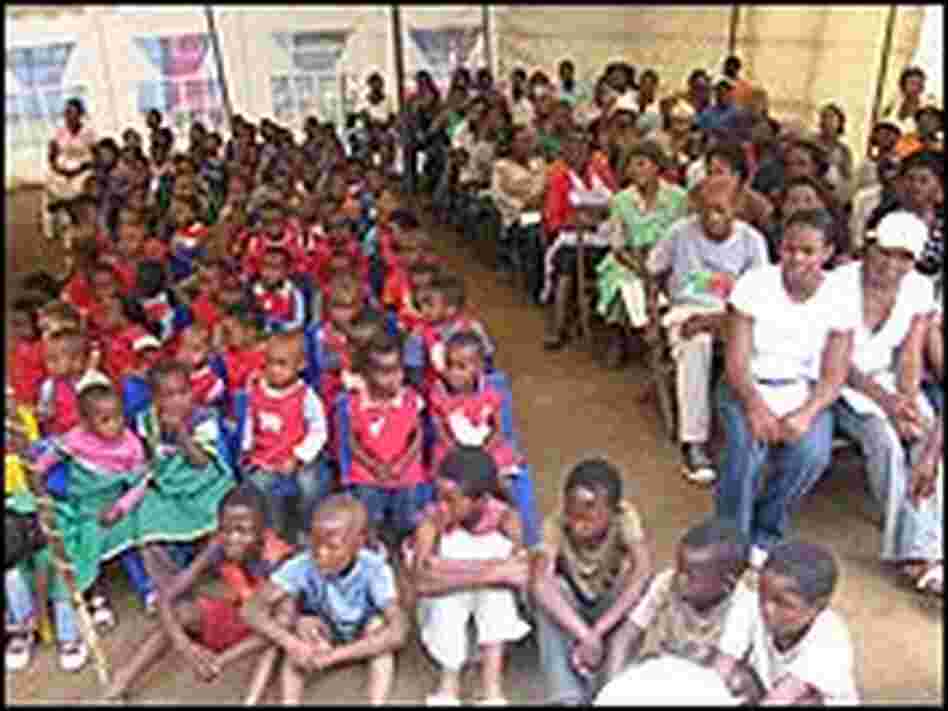 Children listen to the presentation