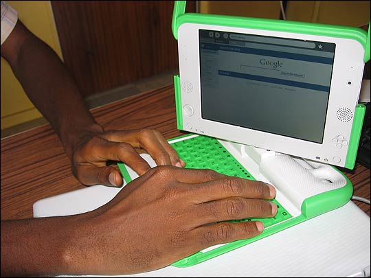 Green and white XO laptops