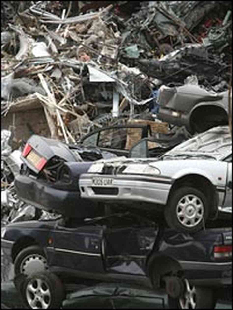 Scrap cars on docks awaiting export in Liverpool, England.