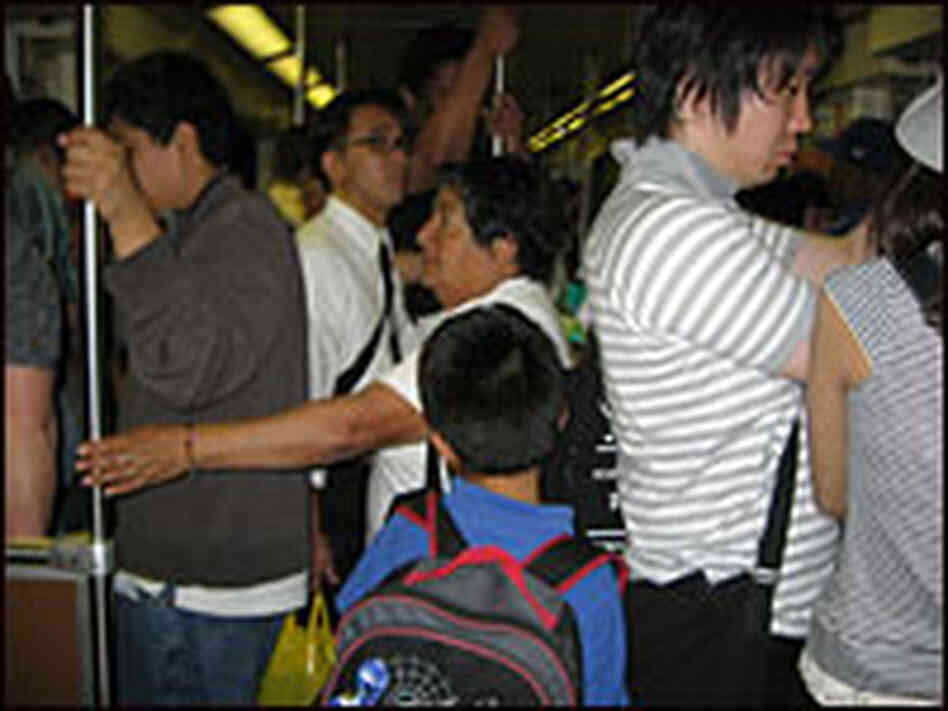 A crowded Los Angeles Metro car. A crowded Los Angeles Metro car.