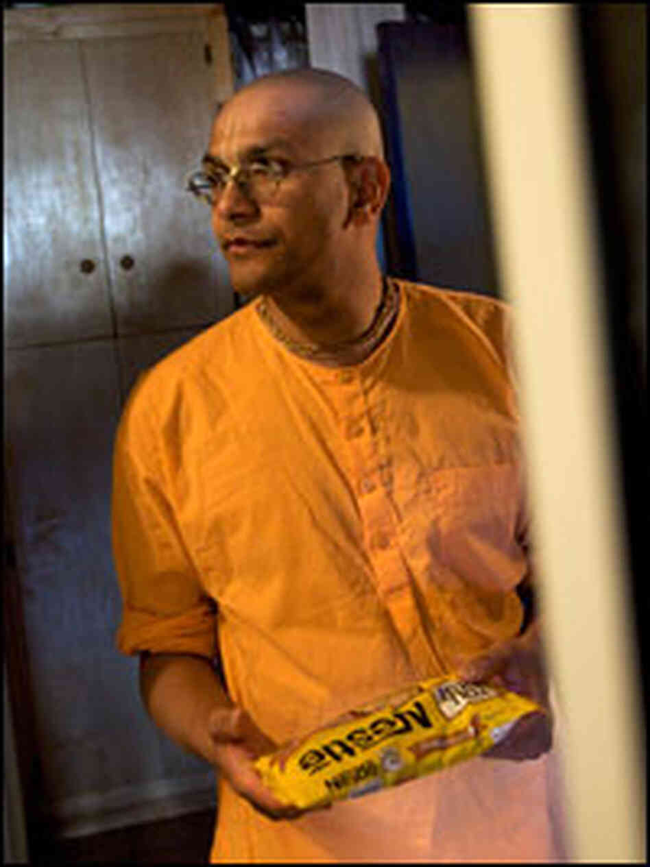 Pandit prepares to make butterscotch halava.