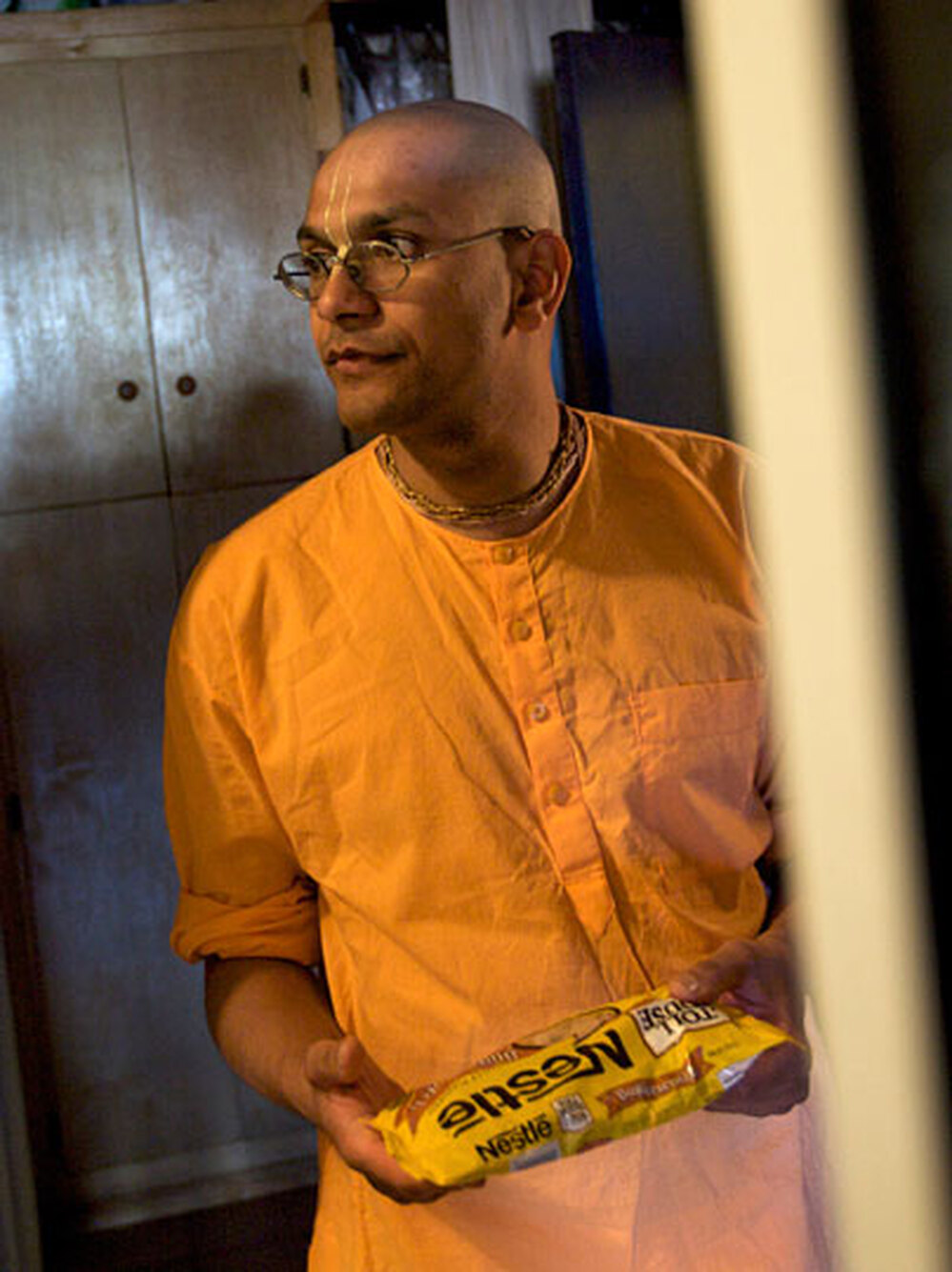 Pandit prepares to make butterscotch halava.