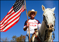 Forest Whorton of Castleton, Va., shows his support for Sen. John McCain by riding his horse along Route 29 on Nov. 1.