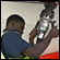 An airline worker removes a fuel line from a Southwest Airlines plane.
