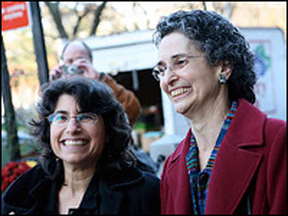 Robin Levine-Ritterman, left, and Barb Levine-Ritterman walk into New Haven City Hall.