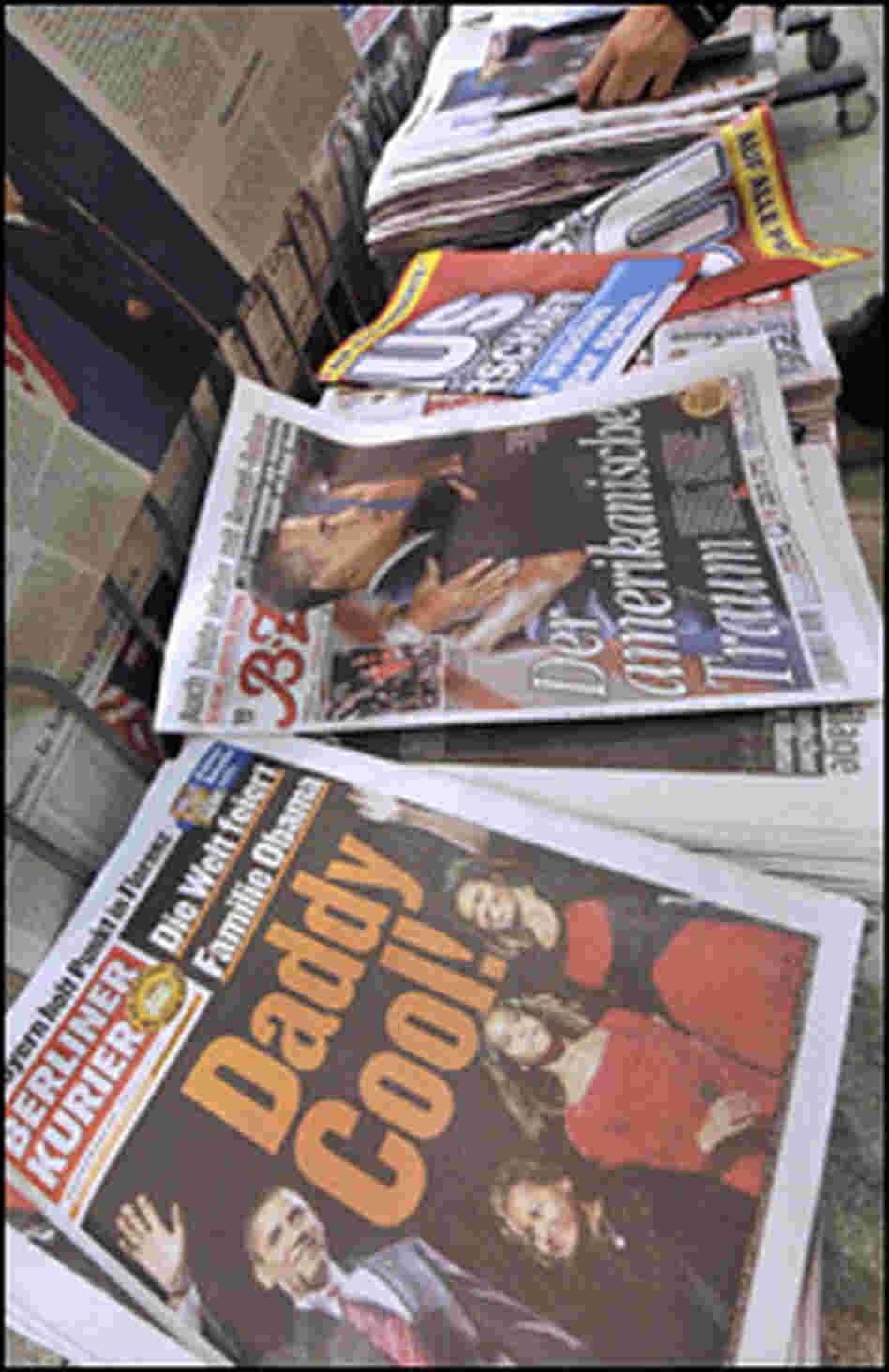 Obama photos grace the covers of German papers at a Berlin newsstand, Nov. 6, 2008.