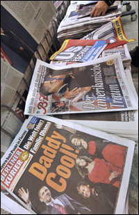 Obama photos grace the covers of German papers at a Berlin newsstand, Nov. 6, 2008.