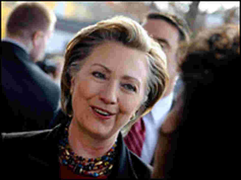 Sen. Hillary Clinton talks with a neighbor after casting her ballot in Chappaqua, N.Y., on Nov. 4.