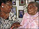Amanda Jones, 109, visits with granddaughter Brenda Baker. Amanda Jones, 109, visits with granddaughter Brenda Baker.