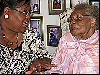 Amanda Jones, 109, visits with granddaughter Brenda Baker.