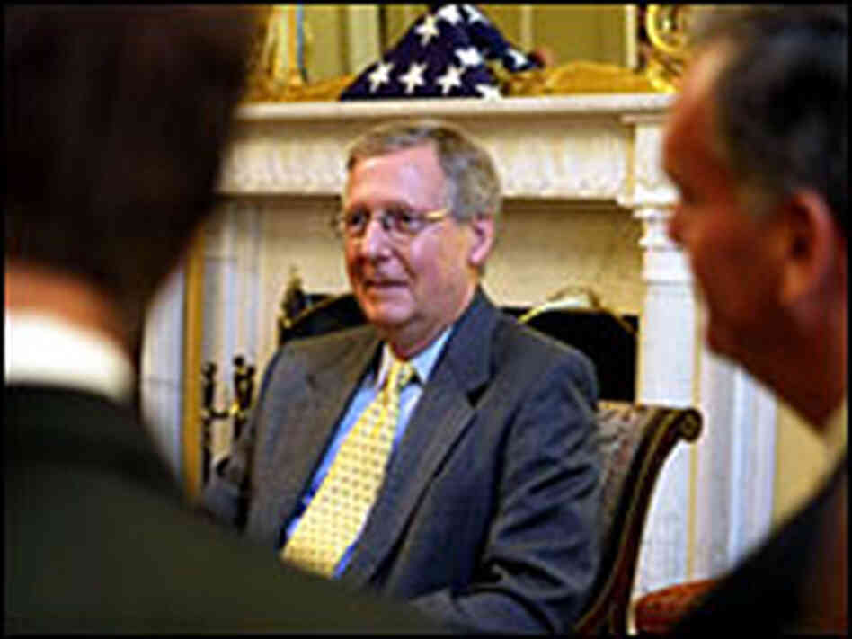 A day before the vote, lawmakers huddled in the office of Minority Leader Mitch McConnell (center).