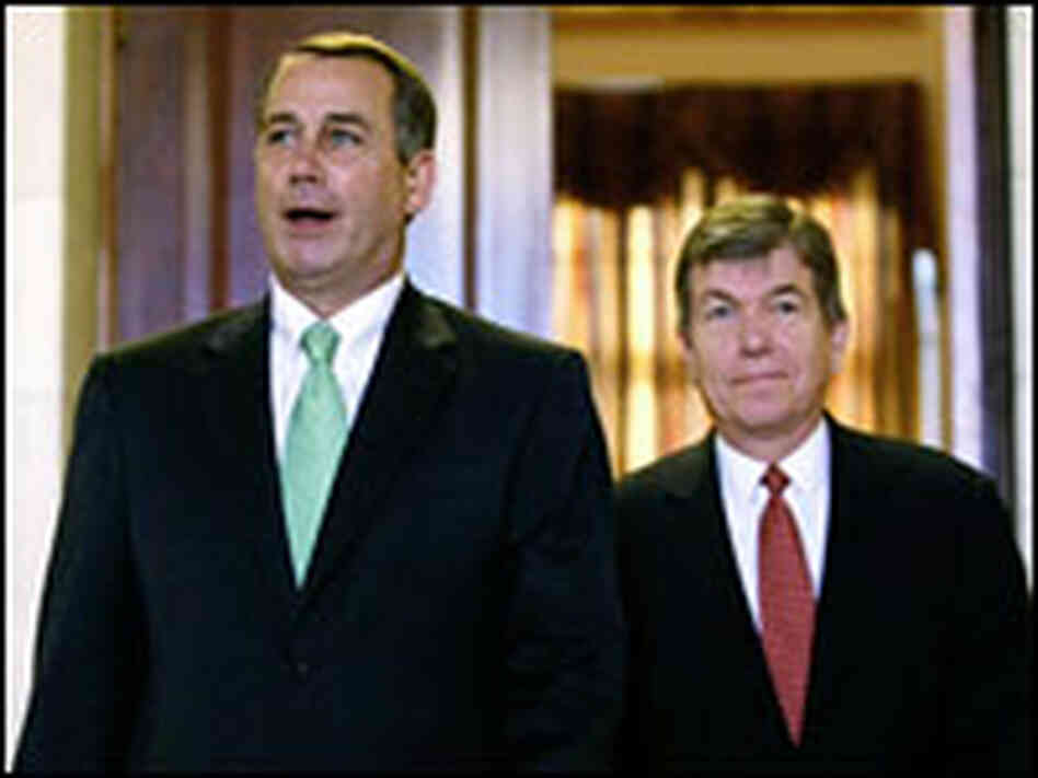 House Minority Leader John Boehner and Minority Whip Roy Blunt emerge from a meeting.