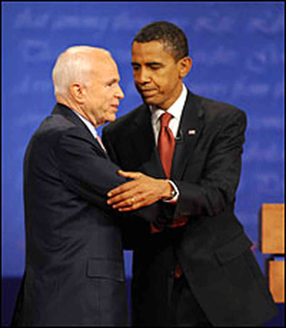 Barack Obama and John McCain shake hands after their first debate. Barack Obama and John McCain shake hands after their first debate.
