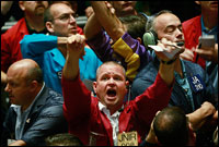 Traders in the S&P 500 stock index futures pit at the Chicago Board of Trade signal offers on Friday