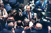 Traders shout orders at the NYSE on Black Monday