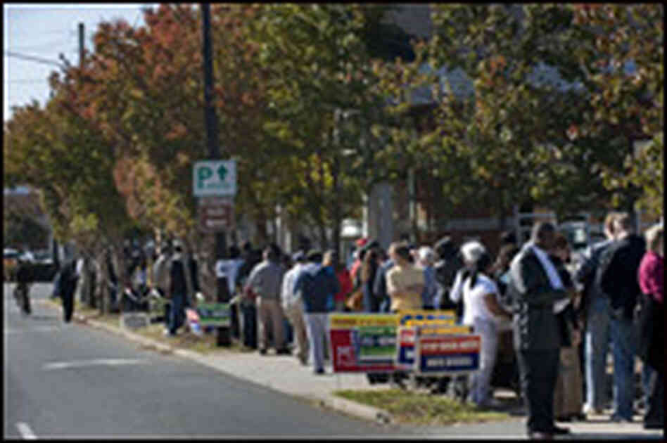 Early voters wait to cast their ballots in Charlotte, N.C.