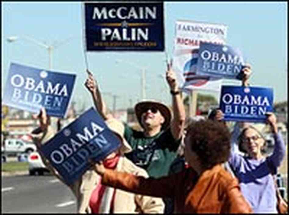 Obama supporters surround a McCain supporter in N.M.  Friday. Credit: Lindsay Pierce/The Daily Times