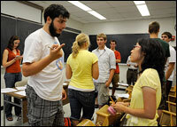 Roger Diehl in chemistry class talking to Hae Yoon Chang, his chemistry lab partner. This was Roger's first day of classes on Sept. 2.