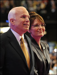 Sen. John McCain and his running mate, Alaska Gov. Sarah Palin, take the stage after McCain's speech at the Republican National Convention.