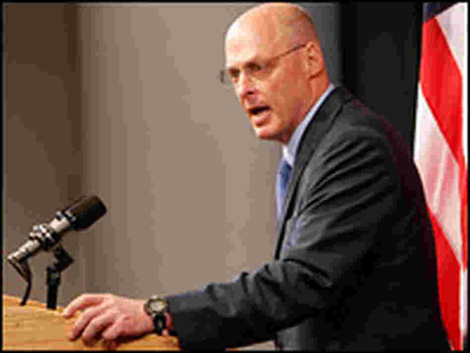 Treasury Secretary Henry Paulson speaks at a news conference on Sunday.