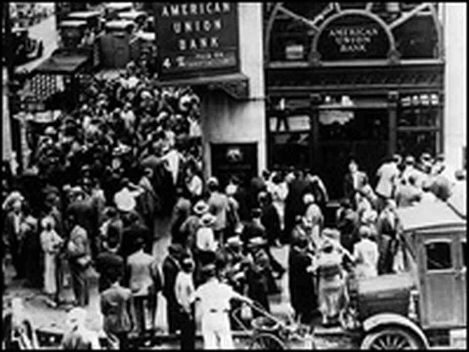 A crowd of depositors gathers outside the American Union Bank after it collapsed in 1931.